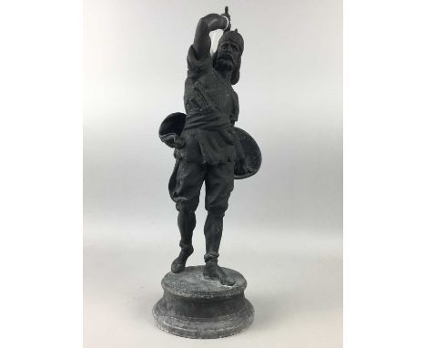 COMPOSITE FIGURE OF AN ANCIENT EASTERN EUROPEAN WARRIOR,likely Russian, modelled throwing an axe, 46cm high