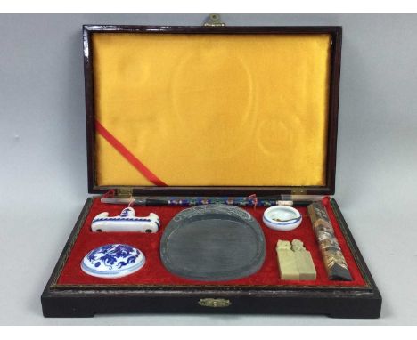 TWO CASED CHINESE CALLIGRAPHY SETS,along with a cased set of inkstone and writing tools, a mother of pearl inlaid rosewood bo