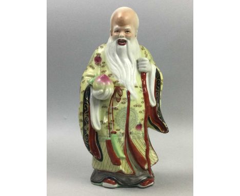 GROUP OF FOUR CHINESE CERAMIC BUDHAI,the largest 24cm tall, along with a figure of Shou Lao (5)