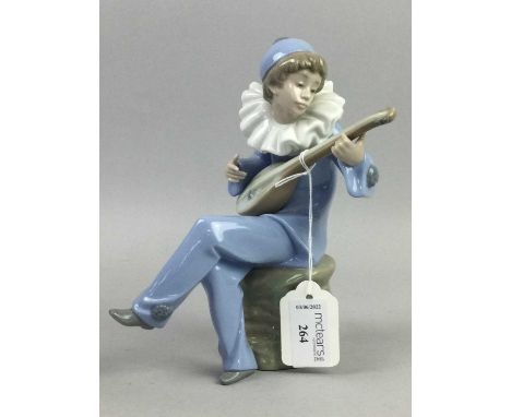 THREE NAO FIGURES,along with a Lladro figure, the tallest figure 23cm high (4)