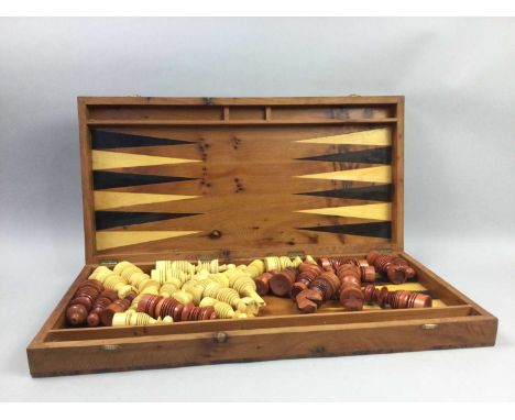 BURR WALNUT VENEERED GAMES BOARD,chess board reversible to backgammon, including large wooden pieces, 60cm wide by 60cm high 