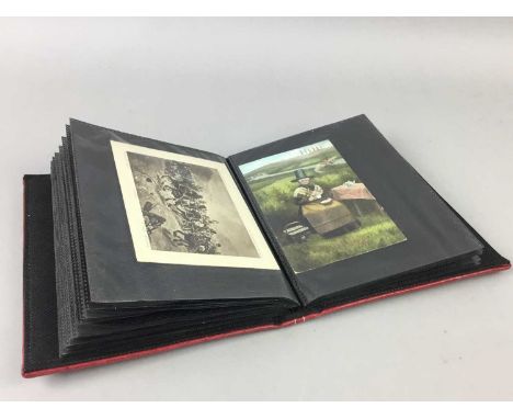 COLLECTION OF VINTAGE AND OTHER POSTCARDS,in a red binder