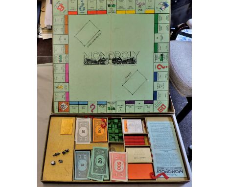 Monopoly - a vintage original set, boxed and as new or little use. Scarce, includes board