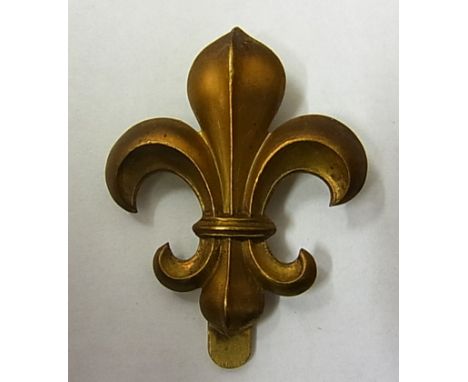 The Manchester Regiment Cap badge (Brass, slider) Maker J. R. Gaunt. K&K: 2014