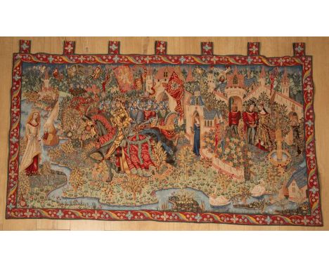 A Medieval style machine made tapestry picture depicting knightly figures, 172cm wide x 96cm high not including the suspensio