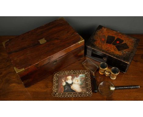 A brass bound writing box the fitted interior with brown tooled leather top, 35cm wide x 21cm deep x 14cm high; a black lacqu