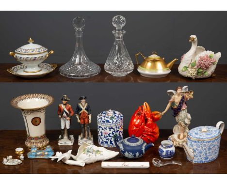 A Limoges twin handled sauce tureen, cover and stand; a 19th century porcelain figure of an angel (heavily restored); two con