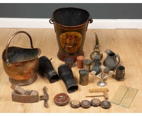 A copper coal scuttle with brass mounts and folding handle, 28cm high; an iron fire bucket painted with a medallion depicting