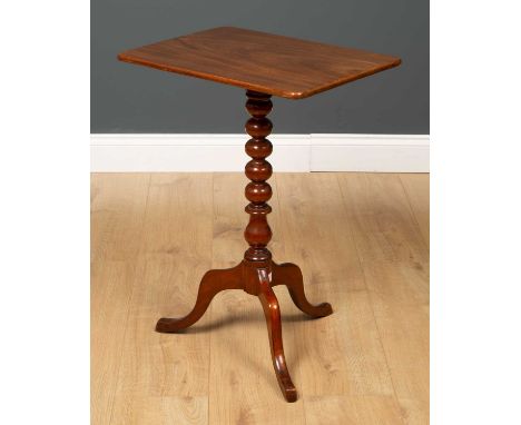 A 19th century mahogany occasional table with a bobbin turned stem, a tripod base, a rectangular top, 50cm wide x 35.5cm deep