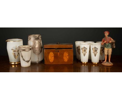 A group of miscellaneous items to include a 19th century mahogany tea caddy, a silver mounted white glass jug and matching be