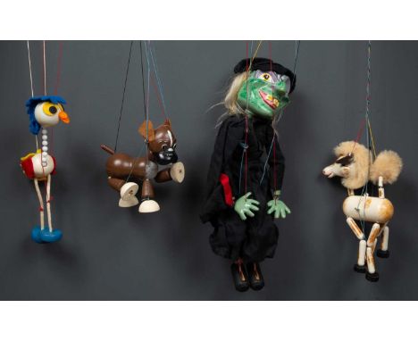 A group of five Pelham Puppets to include a standard puppet, a simple dancing puppet, a puppet horse, a puppet dog and a pupp