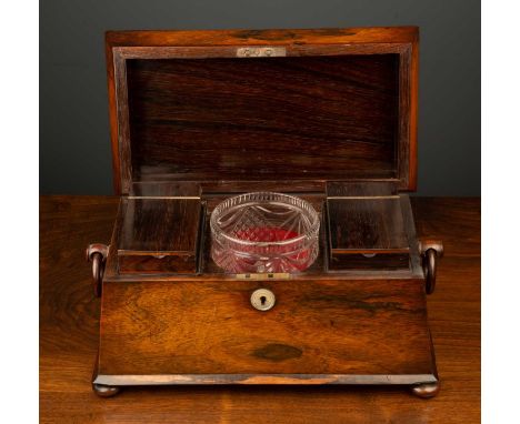 An early Victorian rosewood tea caddy of sarcophagus form with original interior and a 19th century cut glass mixing bowl, ha