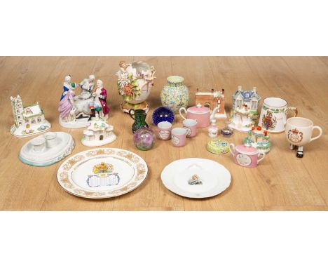 A group of decorative and commemorative ceramics to include six pottery pastille burner style model houses, some by Coalport;