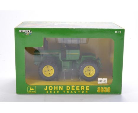 Farm model interest comprising Ertl 1/32  John Deere 8630 Tractor. Looks to be excellent and without obvious sign of fault in