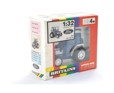 Britains Farm 1/32 issue comprising No. 9495 Ford 2120 Tractor. No obvious sign of wear in very good to excellent box, ex sho
