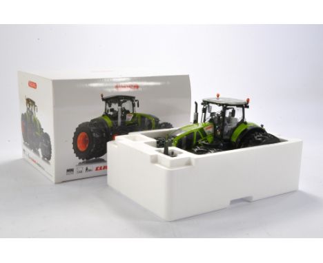 Farm model interest comprising Wiking 1/32 Claas Axion 950 Tractor. Looks to be excellent and without obvious sign of fault i