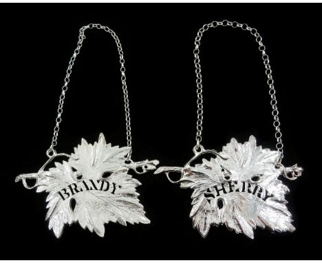 Shop stock: Pair of silver Brandy and Sherry decanter labels in the form of vine leaves by L R Watson Birmingham 2003- 2006, 