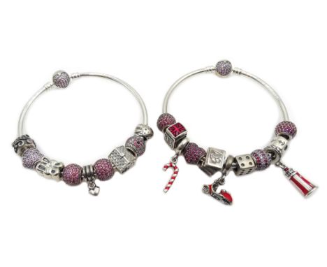 Two silver Pandora charm bracelets, with twenty Pandora charms total, all stamped 925 ALE Condition Report 2x Pandora special