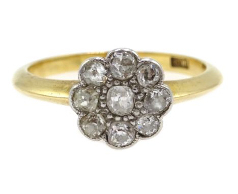 Gold old cut diamond daisy set ring, stamped 18ct Condition Report 3.3gm, size P-Q, head diameter = 10mm Click here for furth