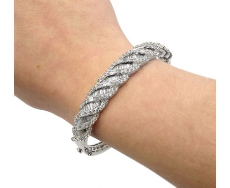 White gold baguette and round brilliant cut diamond hinged bangle, hallmarked 18ct, diamonds 5.19 carat Condition Report Appr