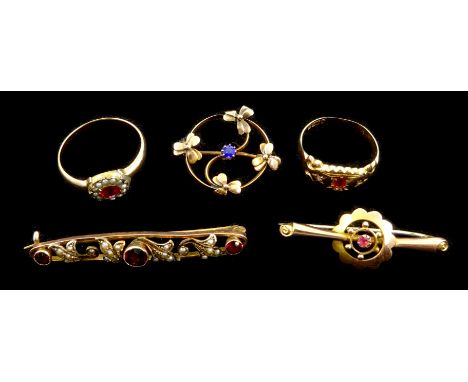 Victorian ruby and seed pearl bar brooch, bar brooch set with pink stone and a circular brooch set with a sapphire all stampe