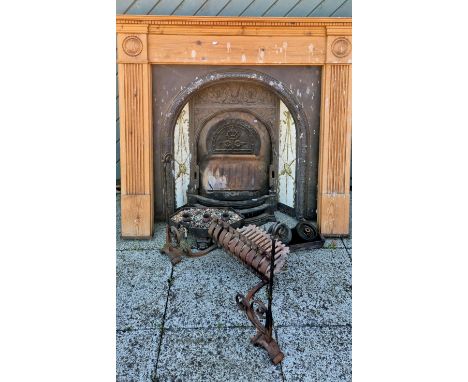 A Victorian cast iron fireplace, having original inset ceramic tiled sides, 96.5x96cm, together with a later pine surround. T