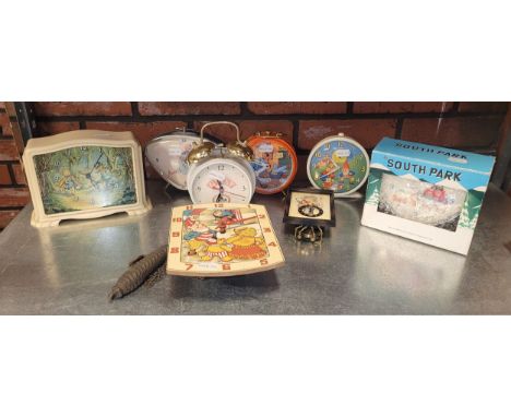 A selection of novelty clocks, to include, a 1950s Smiths alarm clock depicting Noddy. (8)