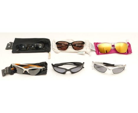 Six pairs of Oakley designer sunglasses. (6) 