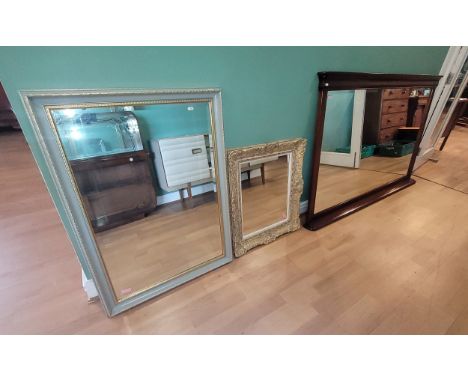 An impressive Edwardian mahogany overmantle mirror, of rectangular form, having bevel edged plate glass, 176x109cm, together 