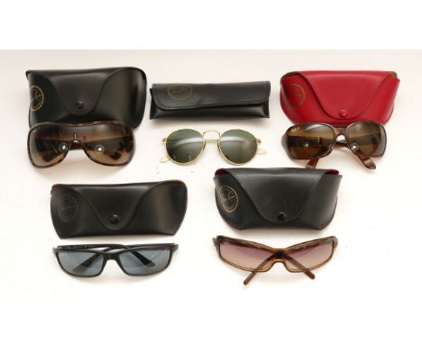 Five cased pairs of Ray-Ban designer sunglasses. 