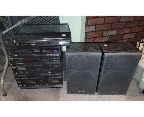 A 1990s Technics Hi-Fi stack system, comprising double cassette deck, amplifier SU-X820, tuner ST-X830L, disc player SL-PJ22 