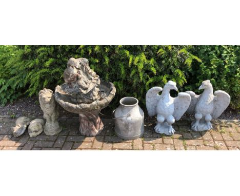 A collection of 20th century reconstituted stone garden ornaments to include a water feature 60cm diameter and 88cm in height