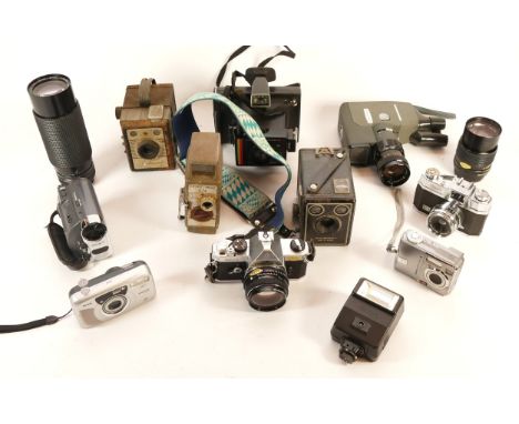 A collection of cameras and camera accessories, to include, Pentax MX, Sirius f/4-5.6 60-300mm, and Canon Reflex Zoom 8-2. (1