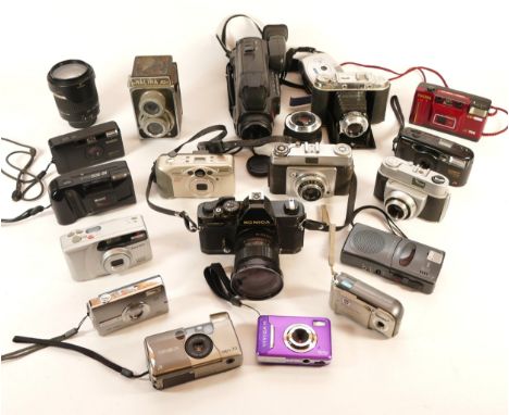A collection of cameras and camera accessories, to include, Konica Auto Reflex T3, Tamron f/3.5-6.3 18-270mm, and Pentax Espi