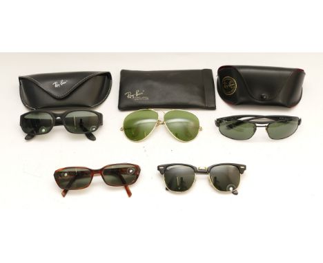 Ray-Ban; Four cased pairs of Ray-Ban designer sunglasses, together with a loose pair. (5)