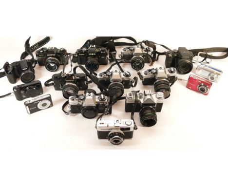A collection of cameras and camera accessories, to include, Olympus OM-10, Olympus OM-1, and Minolta X-700. (1 box)