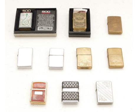A collection of ten pocket Zippo petrol cigarette lighters, to include a boxed commemorative '500 Million' example.