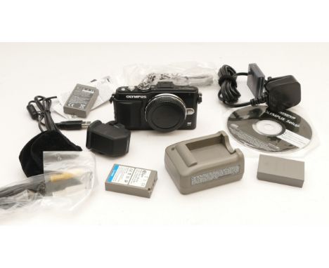 An Olympus Pen Lite E-PL5 mirrorless camera. 