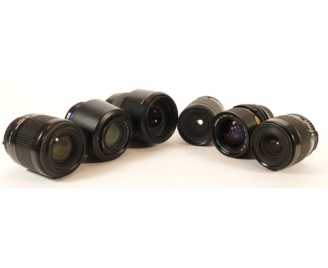 Six camera lenses; Nikon AF Nikkor f/4-5.6 35-80mm, Schneider-Kreuznach f/4-5.6 50-200mm, Tamron f/3.5 35-70mm, Nikon AF Nikk