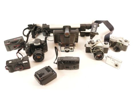 A collection of cameras and camera accessories, to include, Praktica MTL50, Minolta Maxxum 3000si, and Hanimex IC2000. (1 box