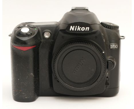 A Nikon D50 DSLR camera, with a Nikon Nikkor AF-S f/3.5-5.6 18-55mm lens, boxed.