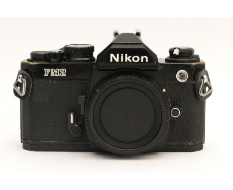 A Nikon FM2 film camera, body only.