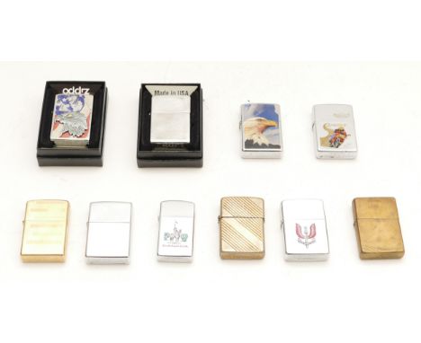 A collection of ten Zippo pocket cigarette lighters, petrol operated, cased and loose examples.