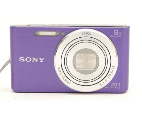 A Sony Cybershot DSC-W830 digital camera, with a Zeiss lens, in purple.