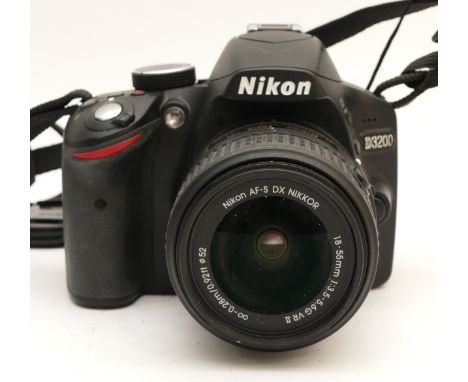 A Nikon D3200 DSLR camera, with a Nikon AF-S F/3.5-5.6 18-55mm lens.