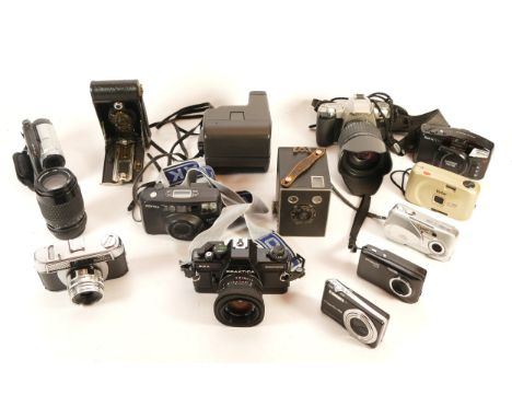 A collection of cameras and camera accessories, to include, Praktica BCA, Pentax MZ-7, and Praktica PB f/4-5.6 70-210mm lens.