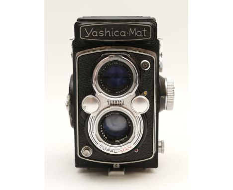 A Yashica Mat TLR camera, with Yashinon f/3.5 80mm lens, serial no. MT 2060556, in leather case.