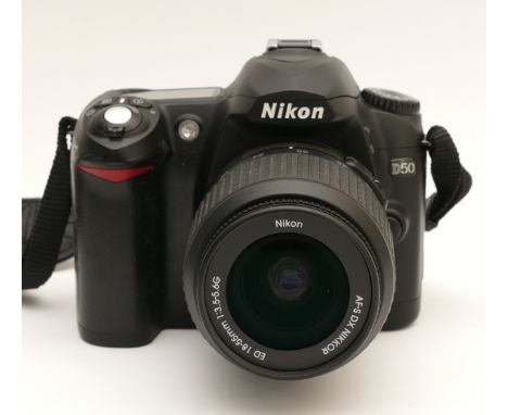 A Nikon D50 digital camera, with a Nikon Nikkor AF-S f/3.5-5.6 18-55mm lens, in original box.