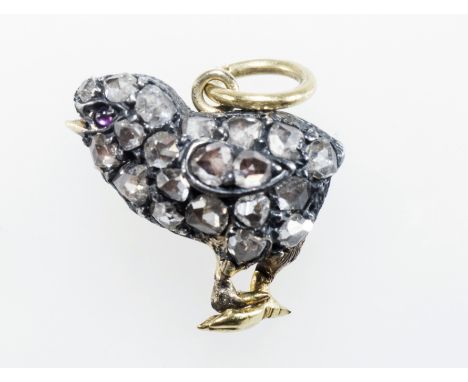 A DIAMOND-SET "CHICK" PENDANT, c.1900, pave set with rose-cut diamonds, ruby eye and mounted in silver and gold. Excluding s