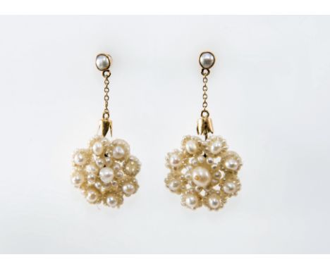 A PAIR OF SEED PEARL DROP EARRINGS, of flowerhead form, suspended from a collet-set seed pearl, post and butterfly fittings. 